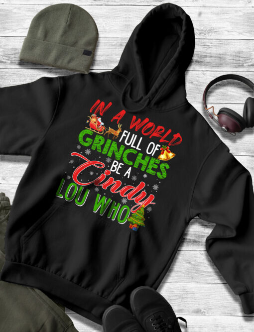2020-11-Women-Hoodie-In-A-World-Full-Of-Grinches-Be-A-Cindy-Lou-Who-Mockup4-Black.jpg